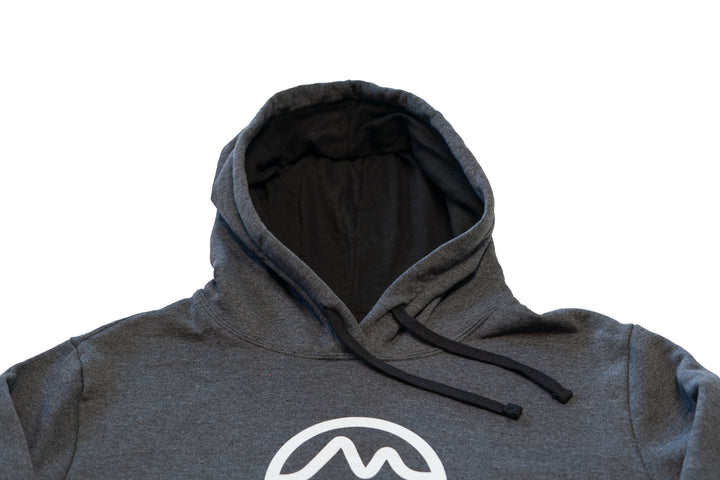 Close up of dark gray hoodie sweater with black interior